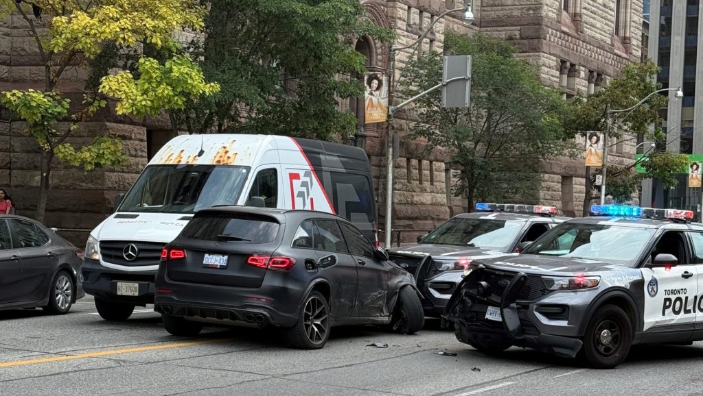 Male Driver Hits Police Car in Downtown Collision